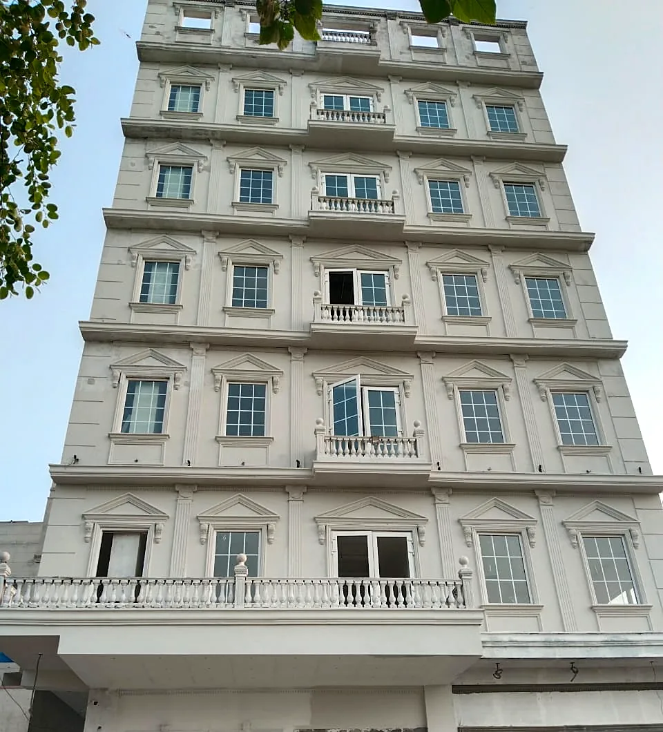 Apartment building: Casement windows opening onto balconies