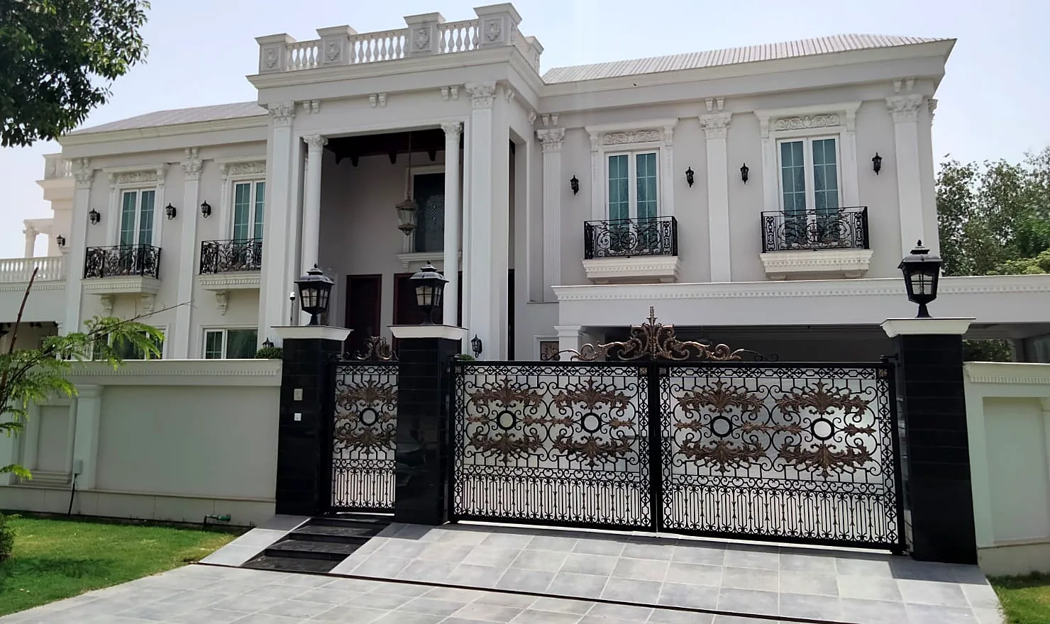 Classic white home with uPVC French windows by Window Concept