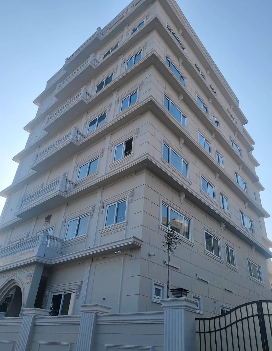 Eight-storey building: White uPVC windows on every floor